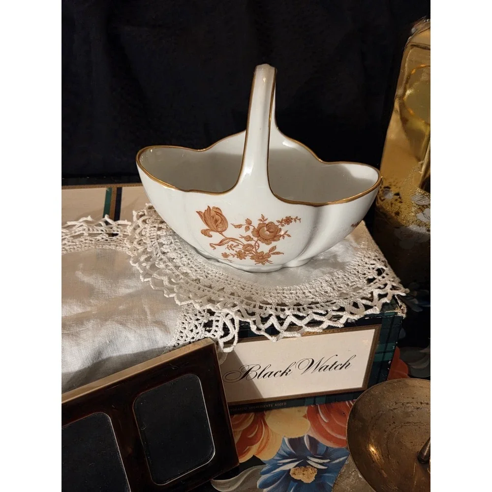 vintage Limoges, France, porcelain compote basket featuring a tall arched...